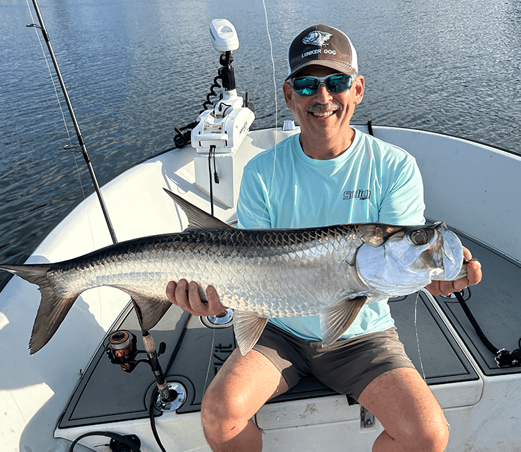 Solo angler showcasing a catch in Hollywood