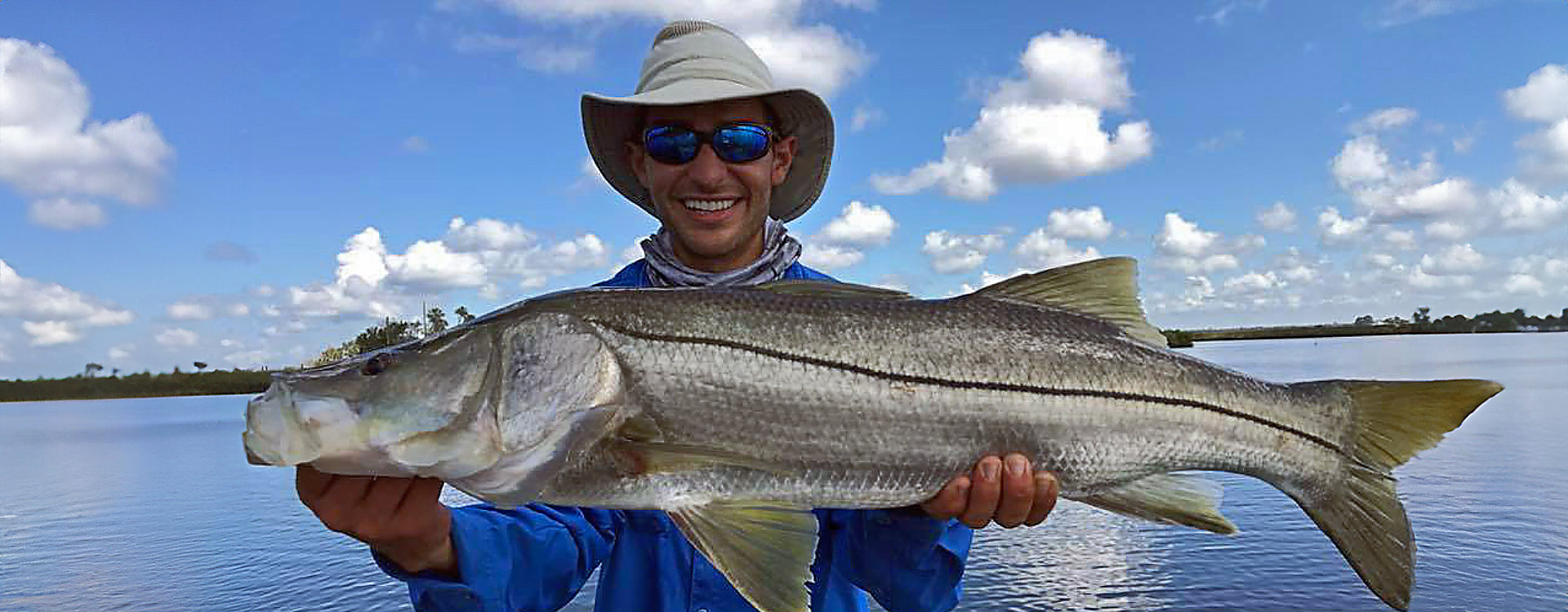 Relaxed moment of a fisherman with a catch