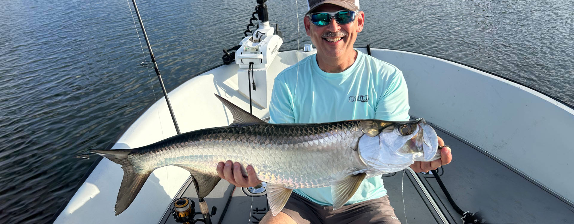 Solo angler showcasing a catch in Hollywood