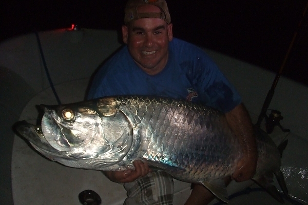 Fisherman with a significant catch in Hollywood, Florida