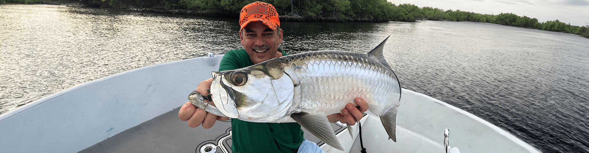 Solo fisherman with a catch in Miami