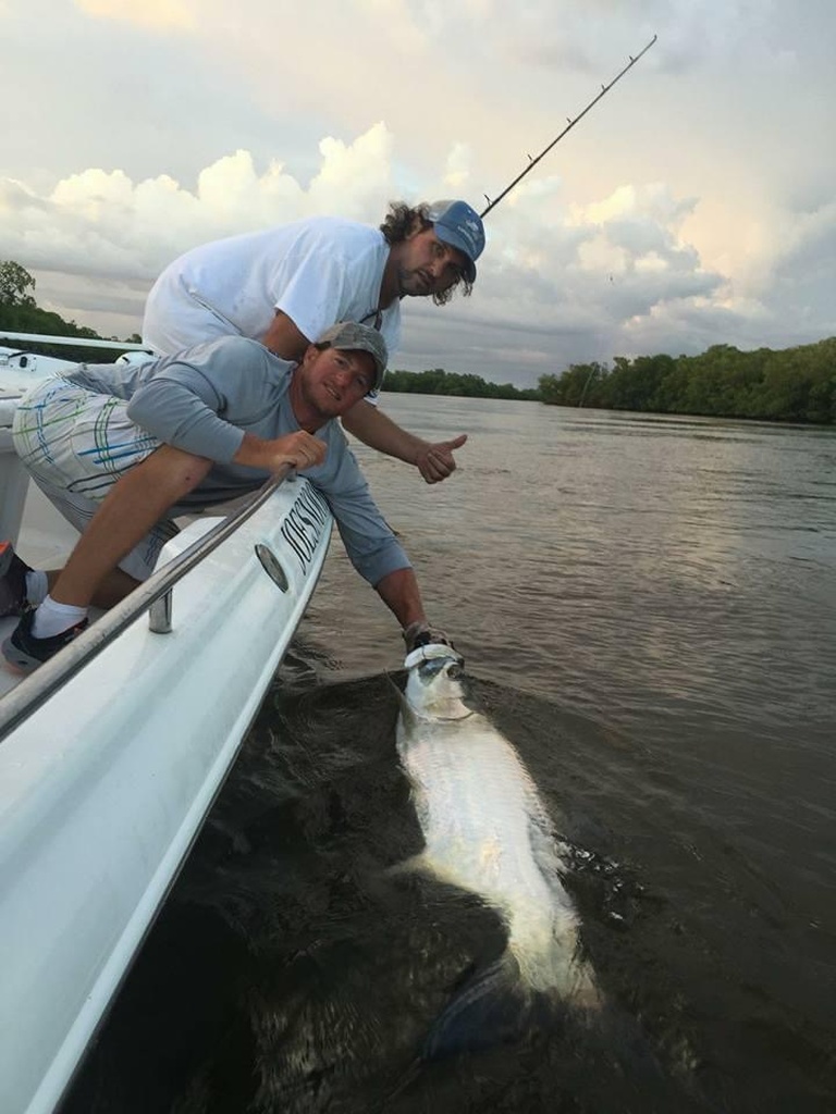 Fisherman with a catch in the sunny waters of Fort Lauderdale