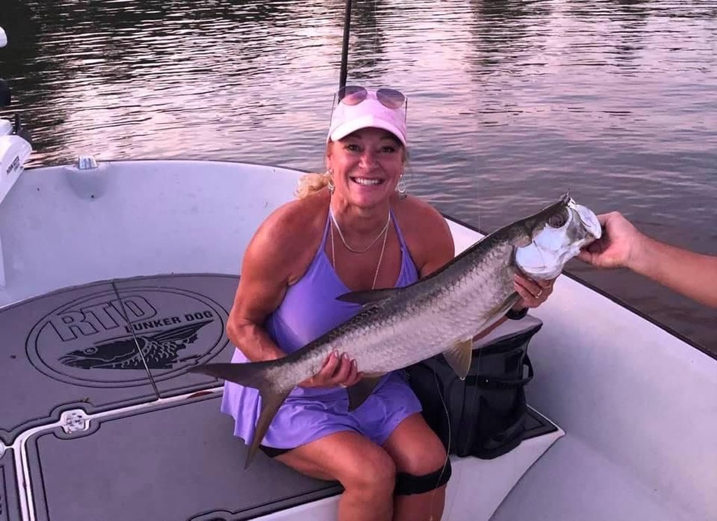 Fisherman with a catch during a charter in Miami