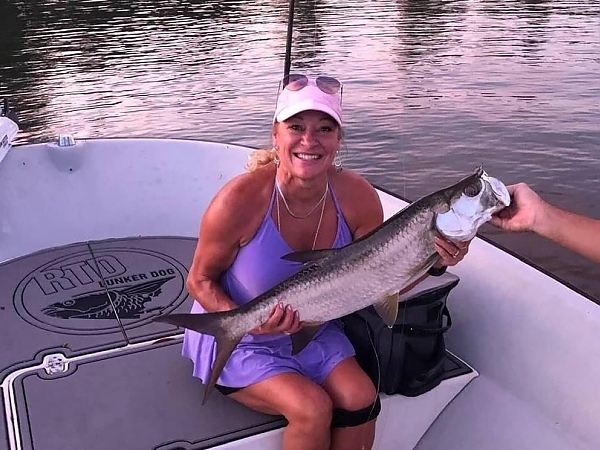 Fisherman with a catch during a charter in Miami