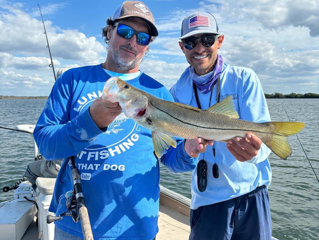 Group enjoying a fishing trip on a boat in Fort Lauderdale