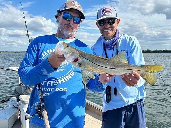 Group enjoying a fishing trip on a boat in Fort Lauderdale