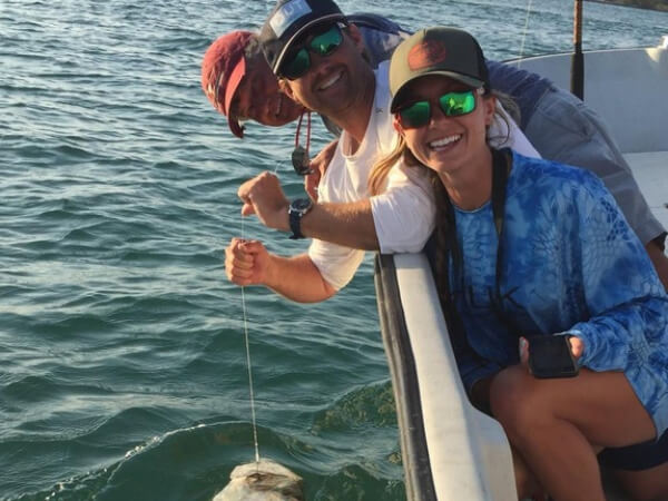 Fisherman with a catch during a charter in Miami