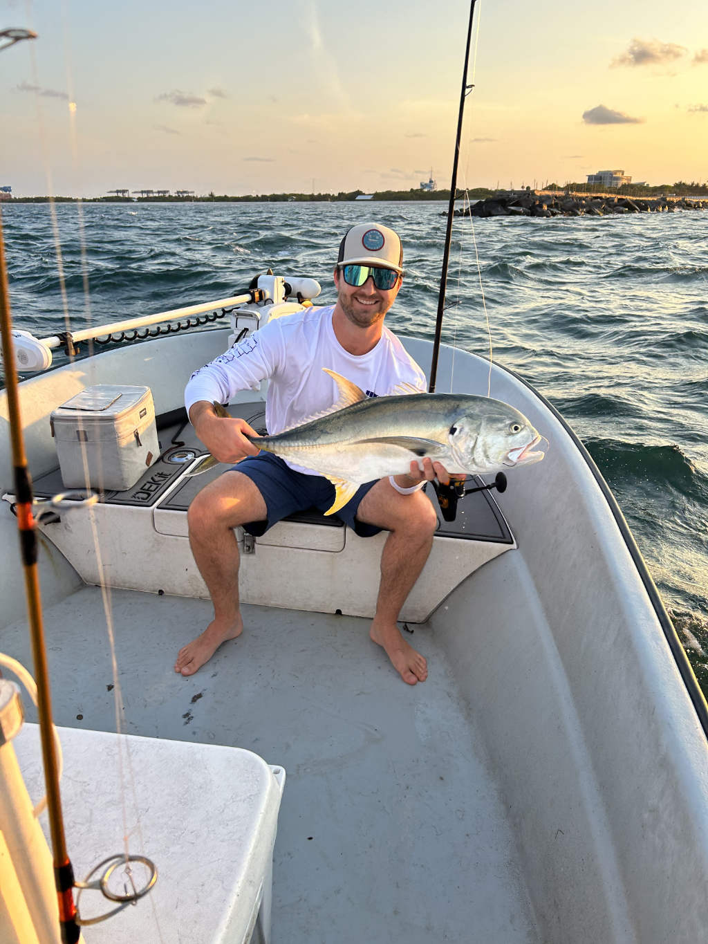 Fisherman with a catch on a beach in Fort Lauderdale