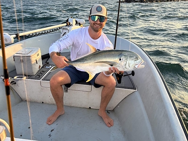 Fisherman with a catch on a beach in Fort Lauderdale