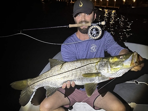 Young boys showcasing their catch on a Fort Lauderdale fishing trip