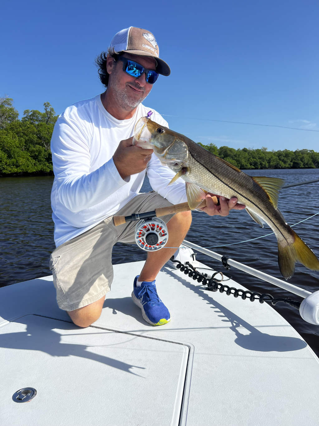 Fisherman with a catch aboard a boat in Fort Lauderdale