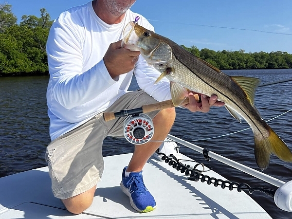 Fisherman with a catch aboard a boat in Fort Lauderdale