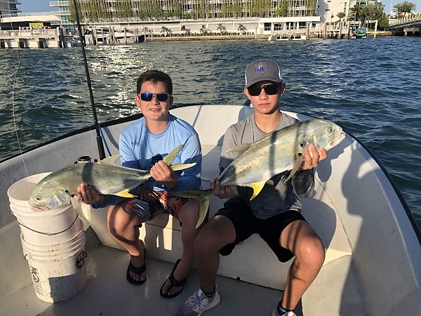 Fisherman with a catch aboard a boat in Miami