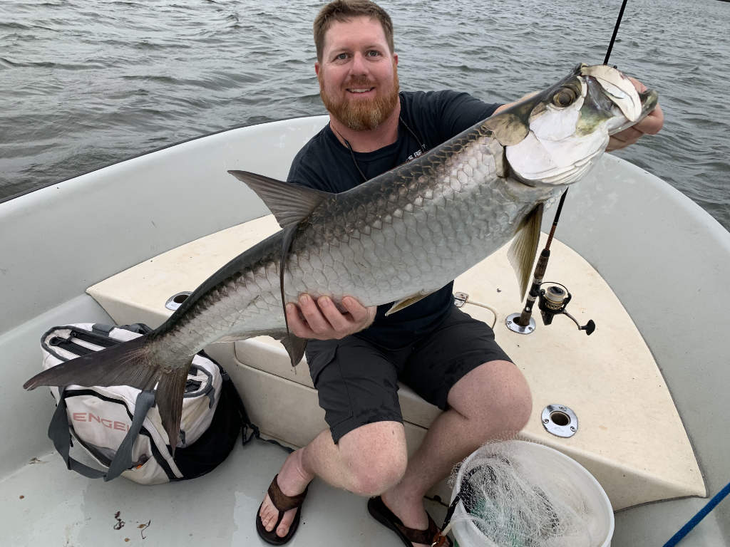 Fisherman showcasing a catch near Fort Lauderdale