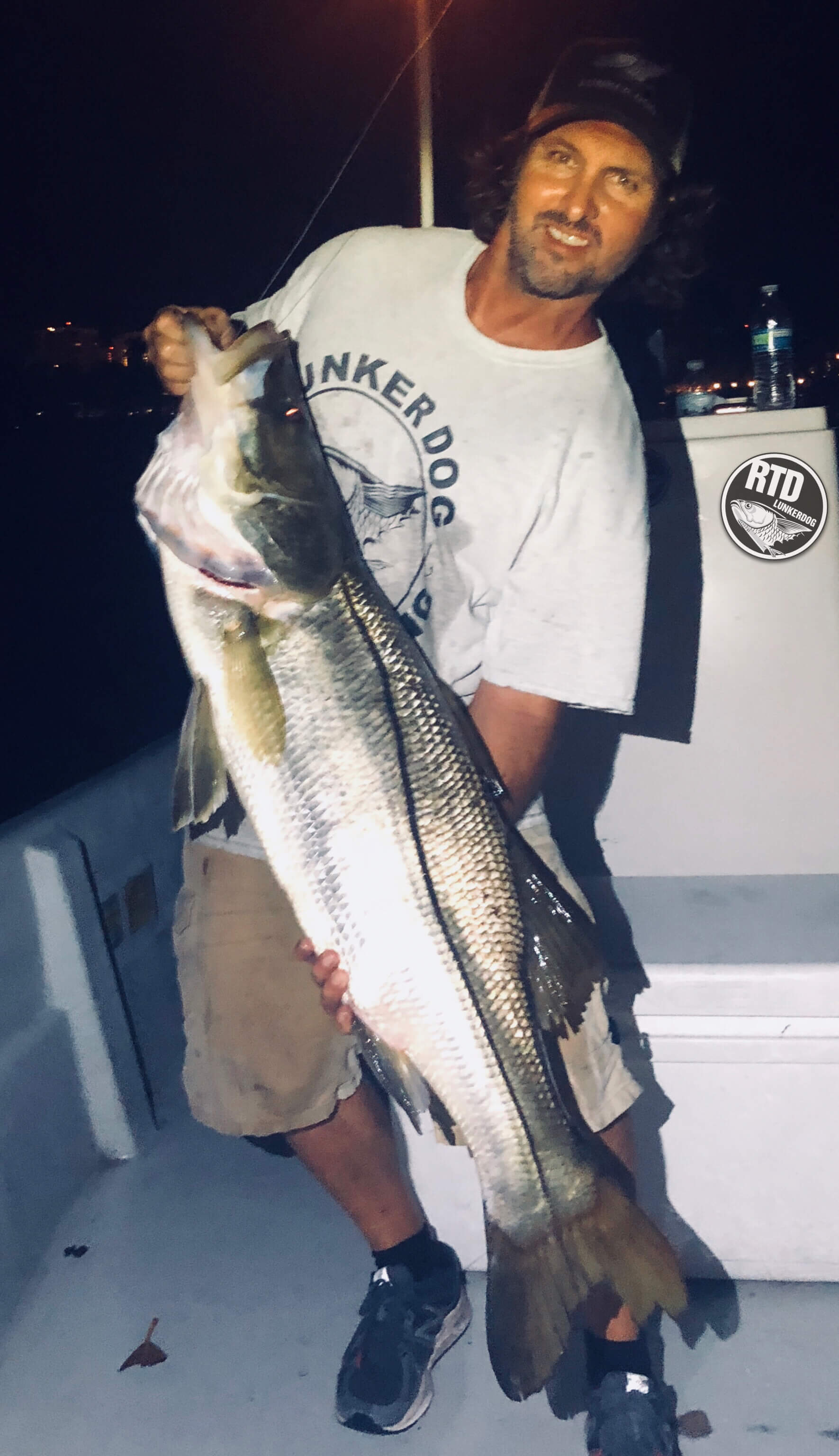 Fisherman with a catch in the waters of Miami