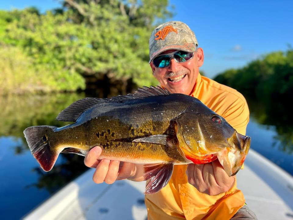 Two men enjoying a catch in Boca Raton