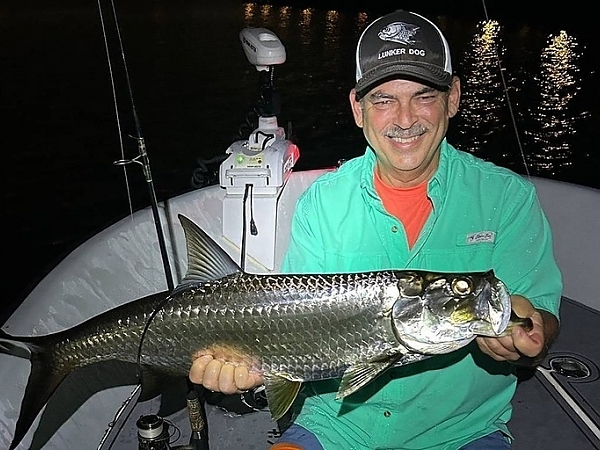 Group fishing adventure at sunset in Boca Raton waters